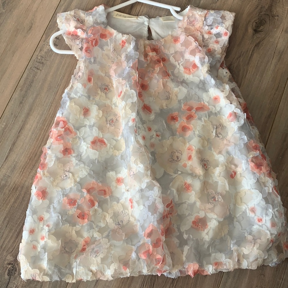 Never been worn tags inside with diaper cover connected to dress